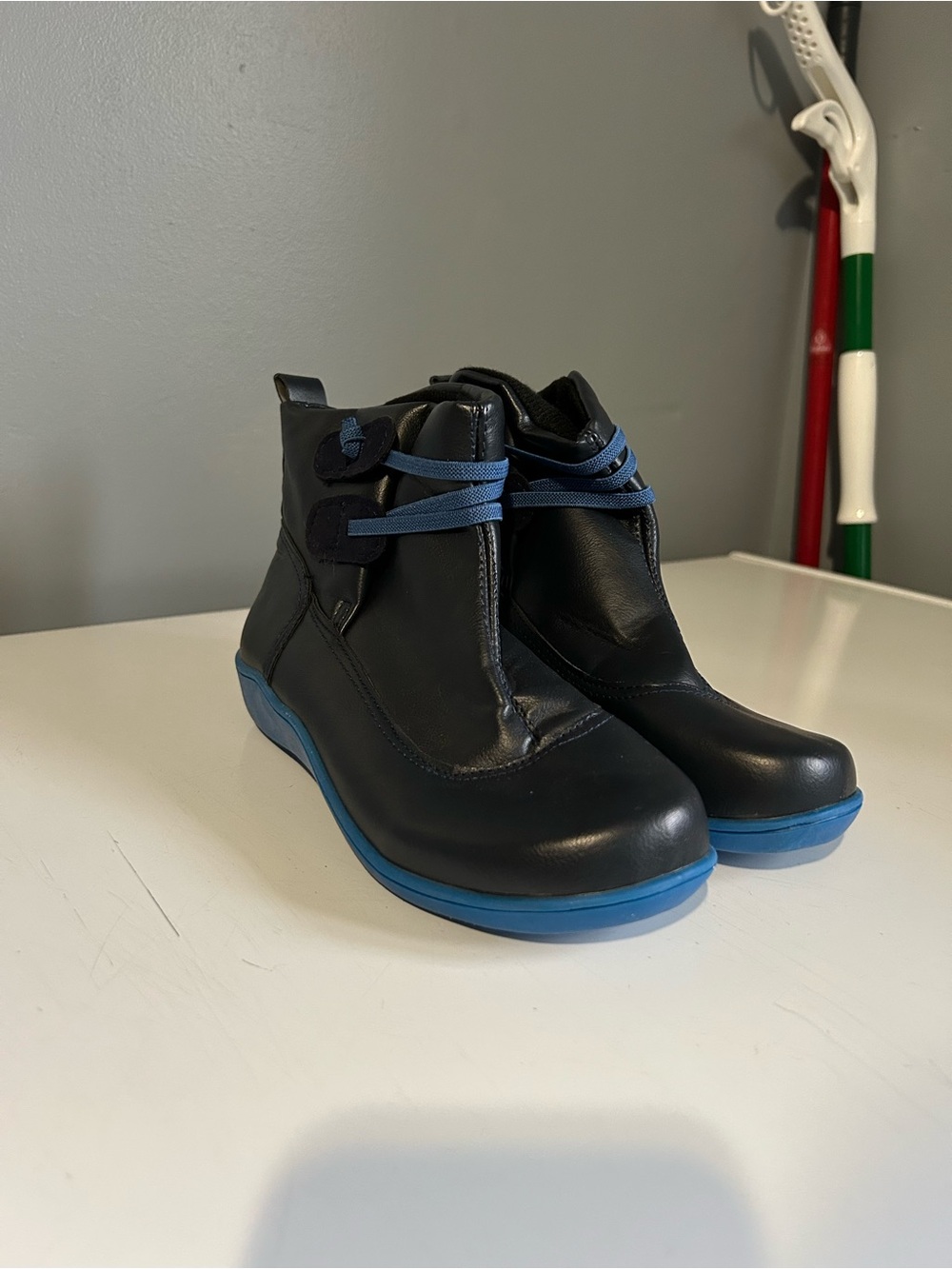 Black Leather Ankle Boots with Blue Soles